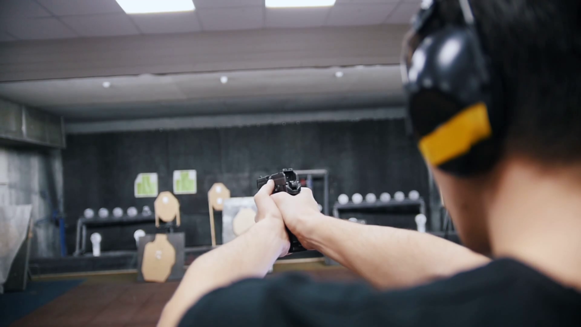 Shooting Gallery Young Man In Headphones Stock Footage SBV331510999