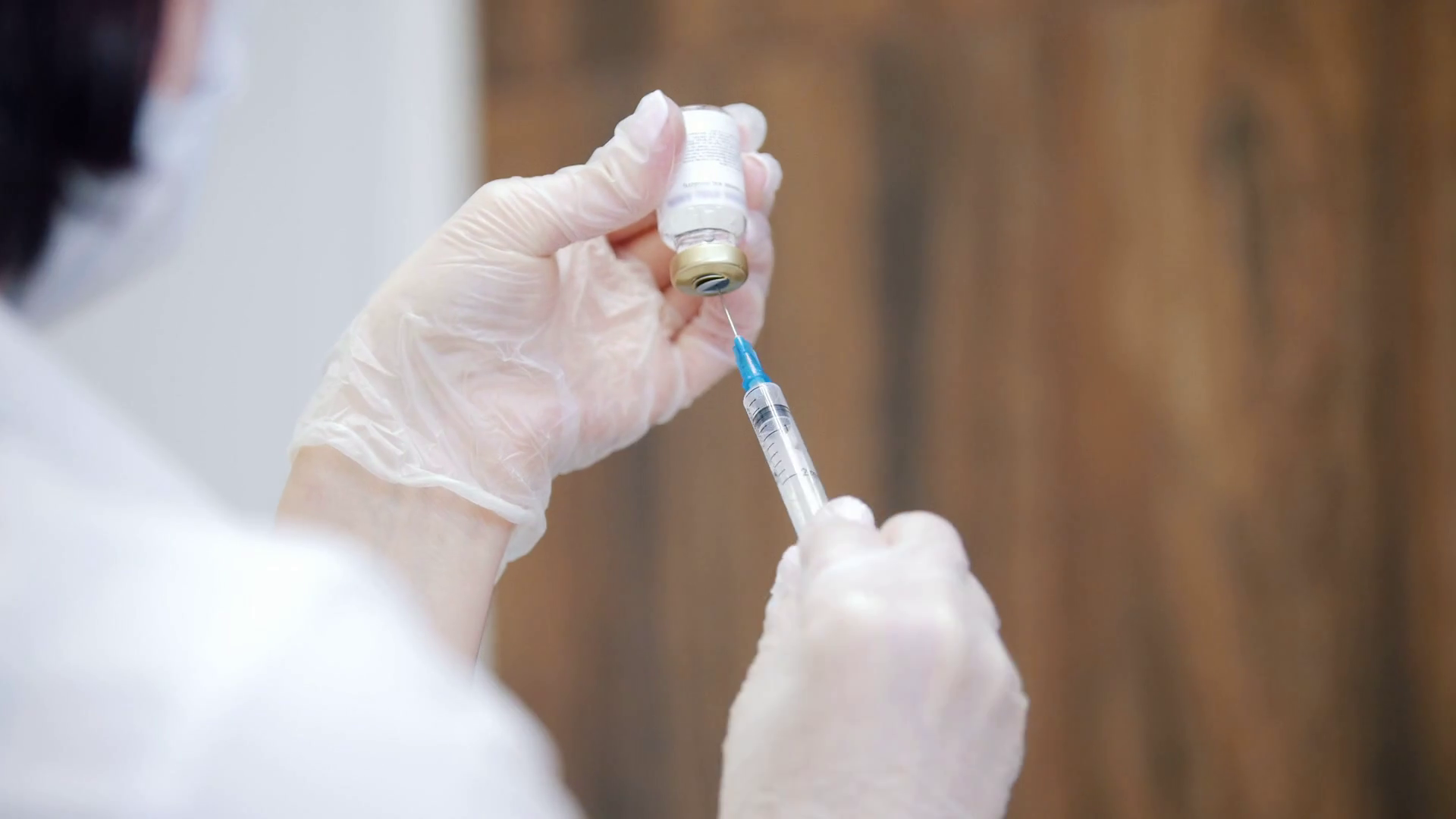 Syringe Needle Pierces Rubber Stopper Of Stock Footage SBV328350926