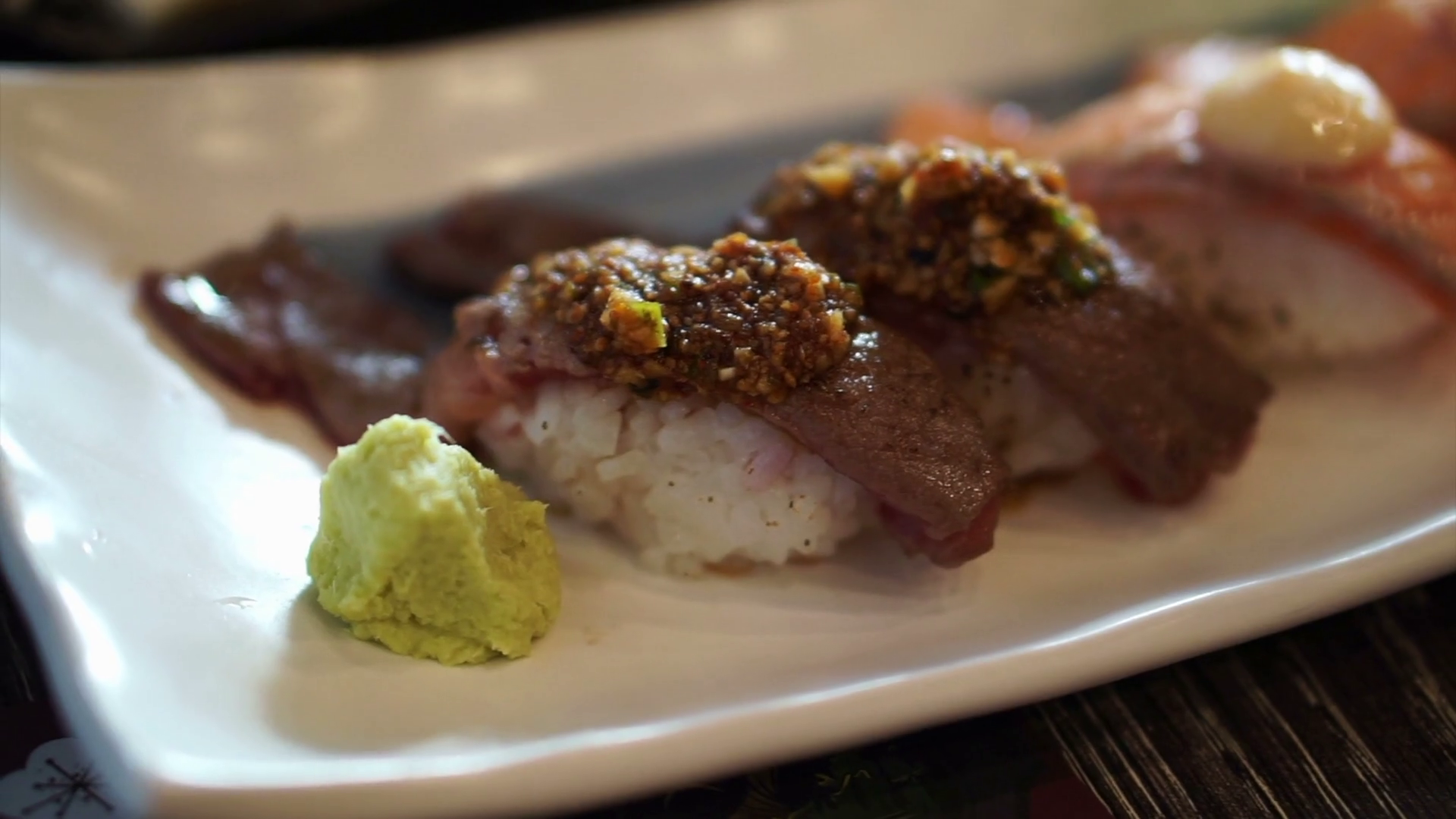 Aburi Nigiri, seared beef and salmon sushi Japanese cuisine half cook