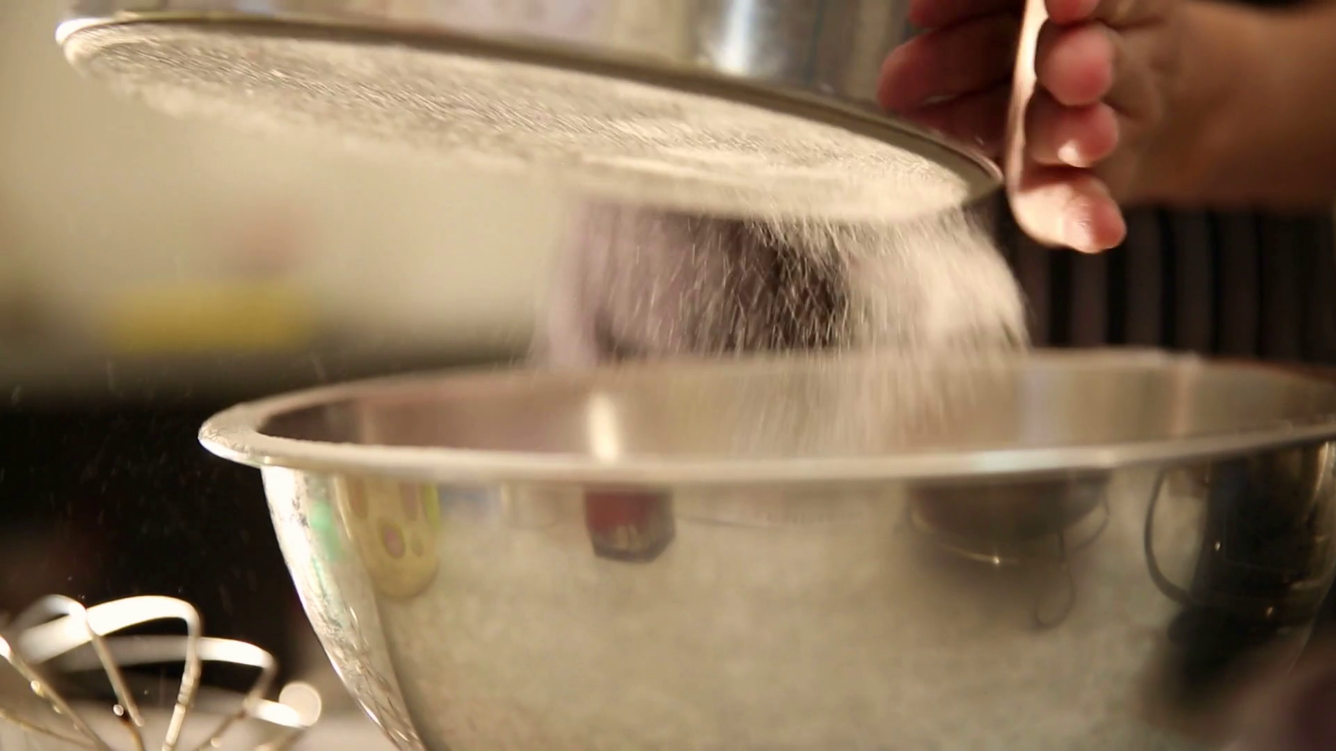Video Hand Sifting Dusting Flour With Light Stock Footage SBV304468490