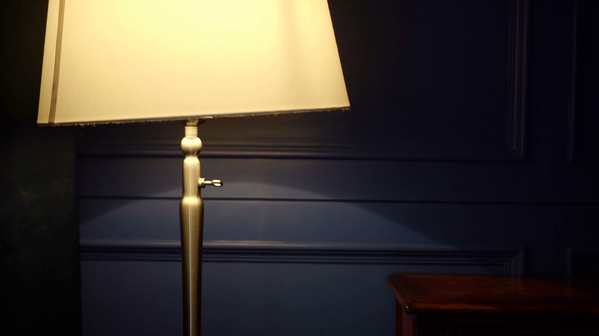 Luxury lamp light illuminate at night on blue hotel wall Stock Video