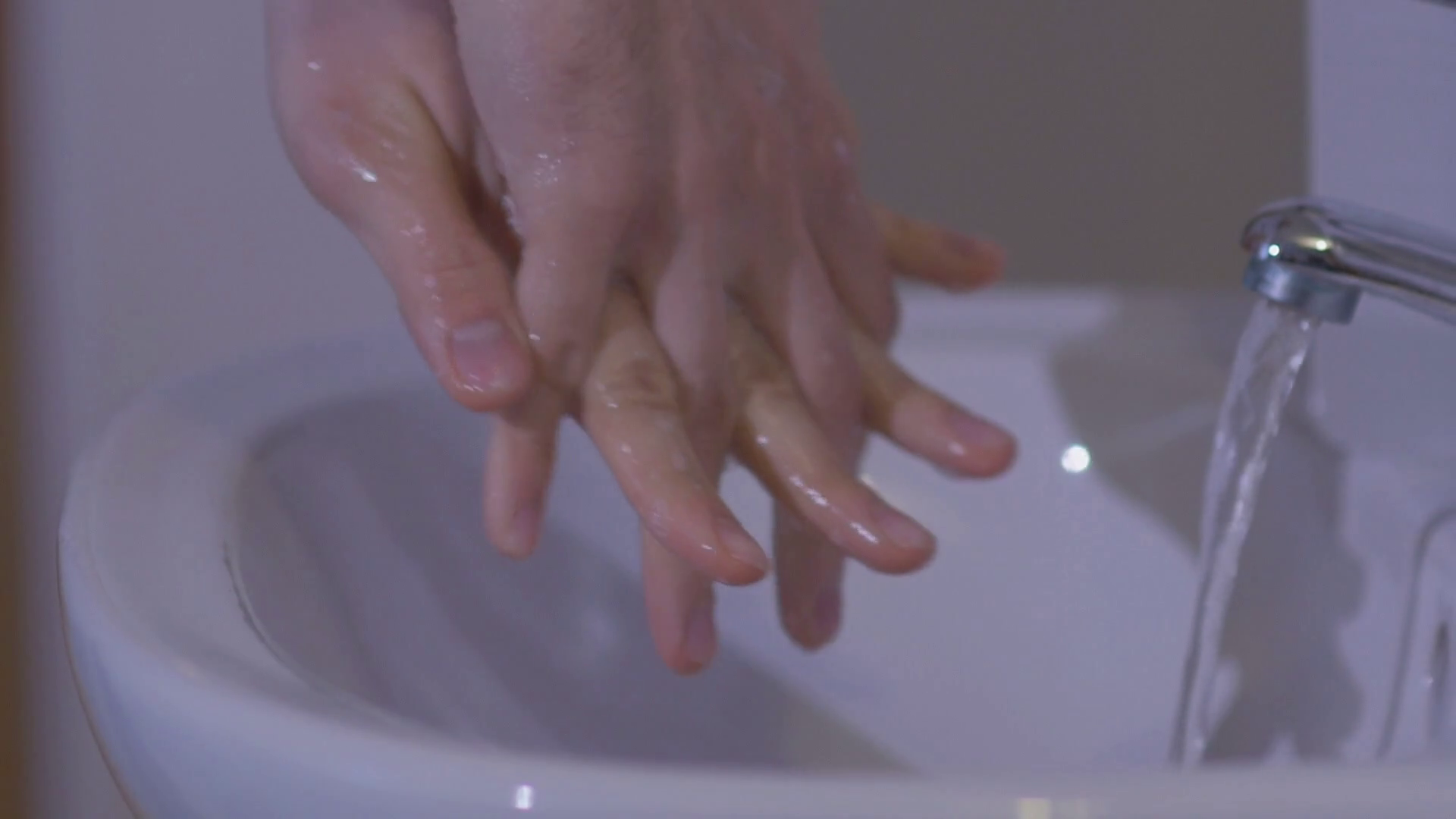 doctor carefully wash their hands before surgery. Slow motion Stock