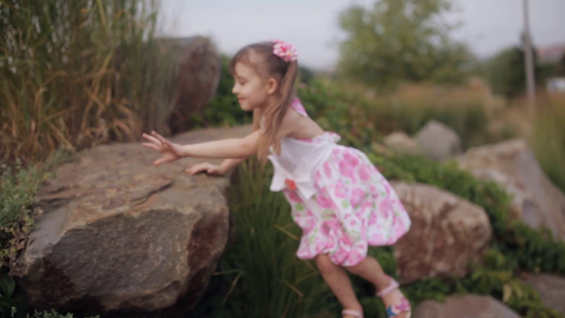 Little Girl In Summer Dress Climbing Stock Footage SBV312319177