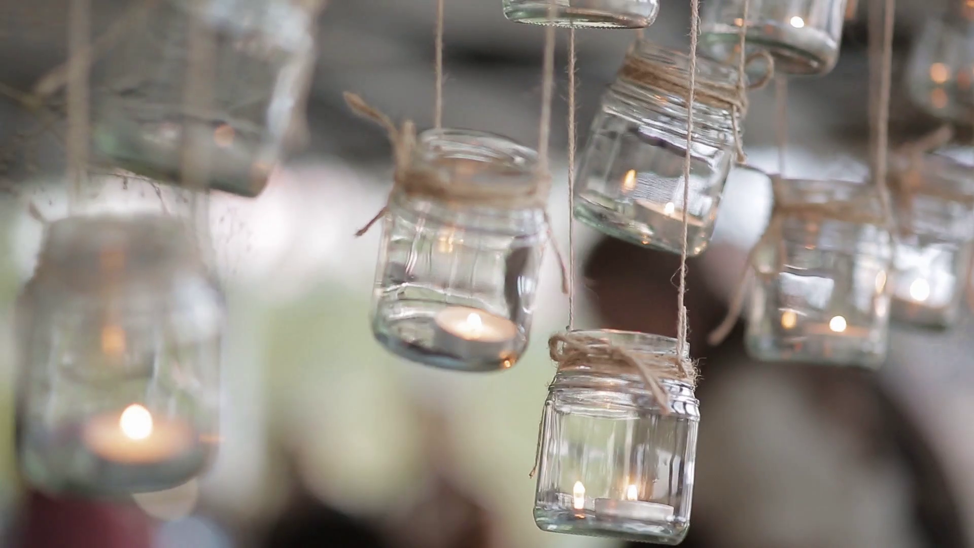mason jar candle hanging on tree for wedding decor Stock Video Footage