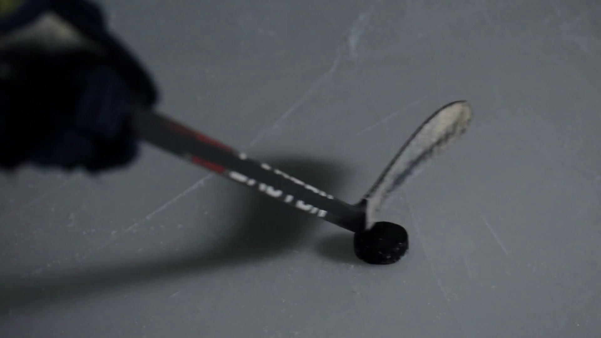 Closeup Hockey Stick Hitting Hockey Puck Stock Footage SBV334581842