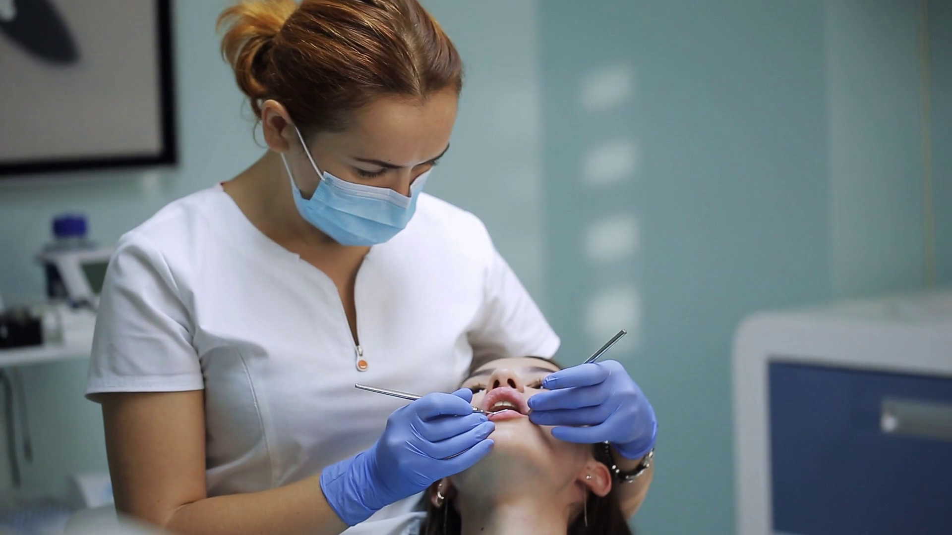 Dentist Checkup. Dentist checking a woman for cavities. Stock Video