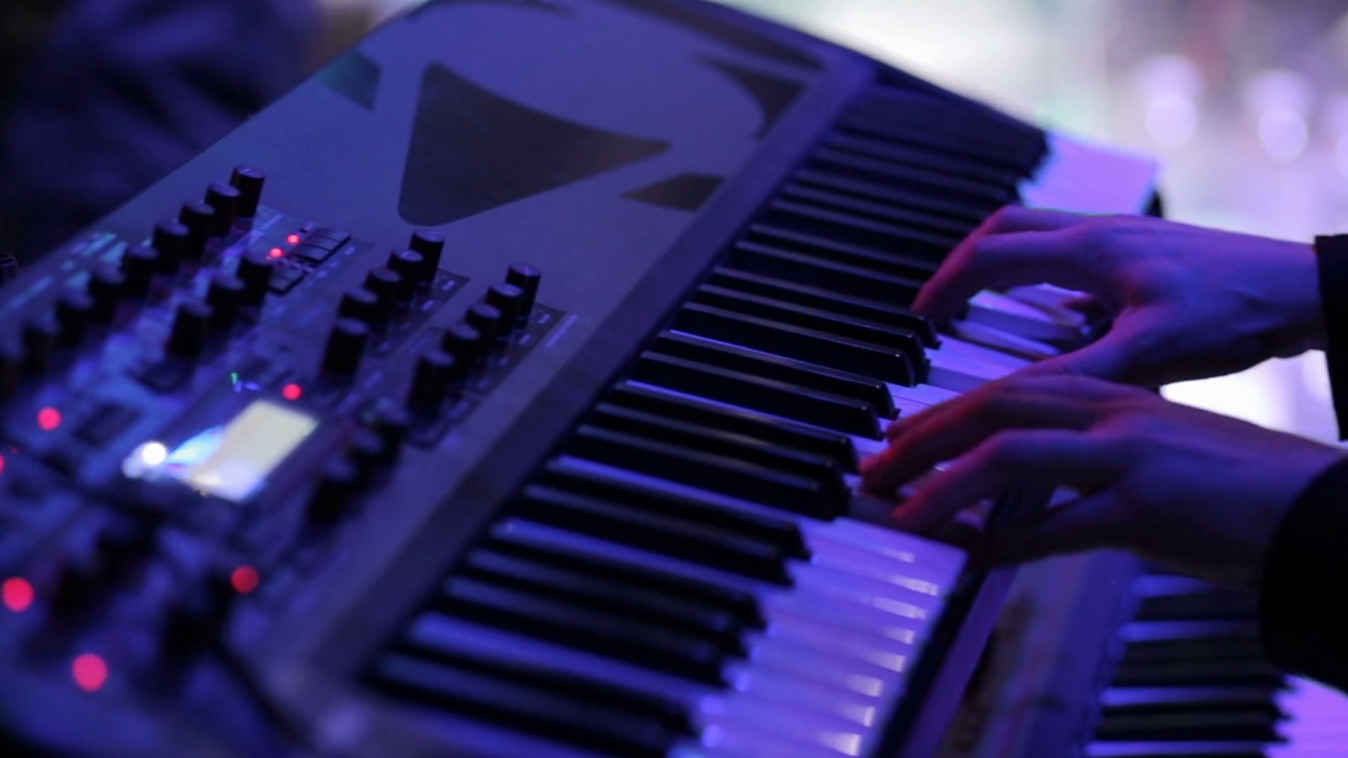 Man playing on synthesizer at a rock concert Stock Video Footage