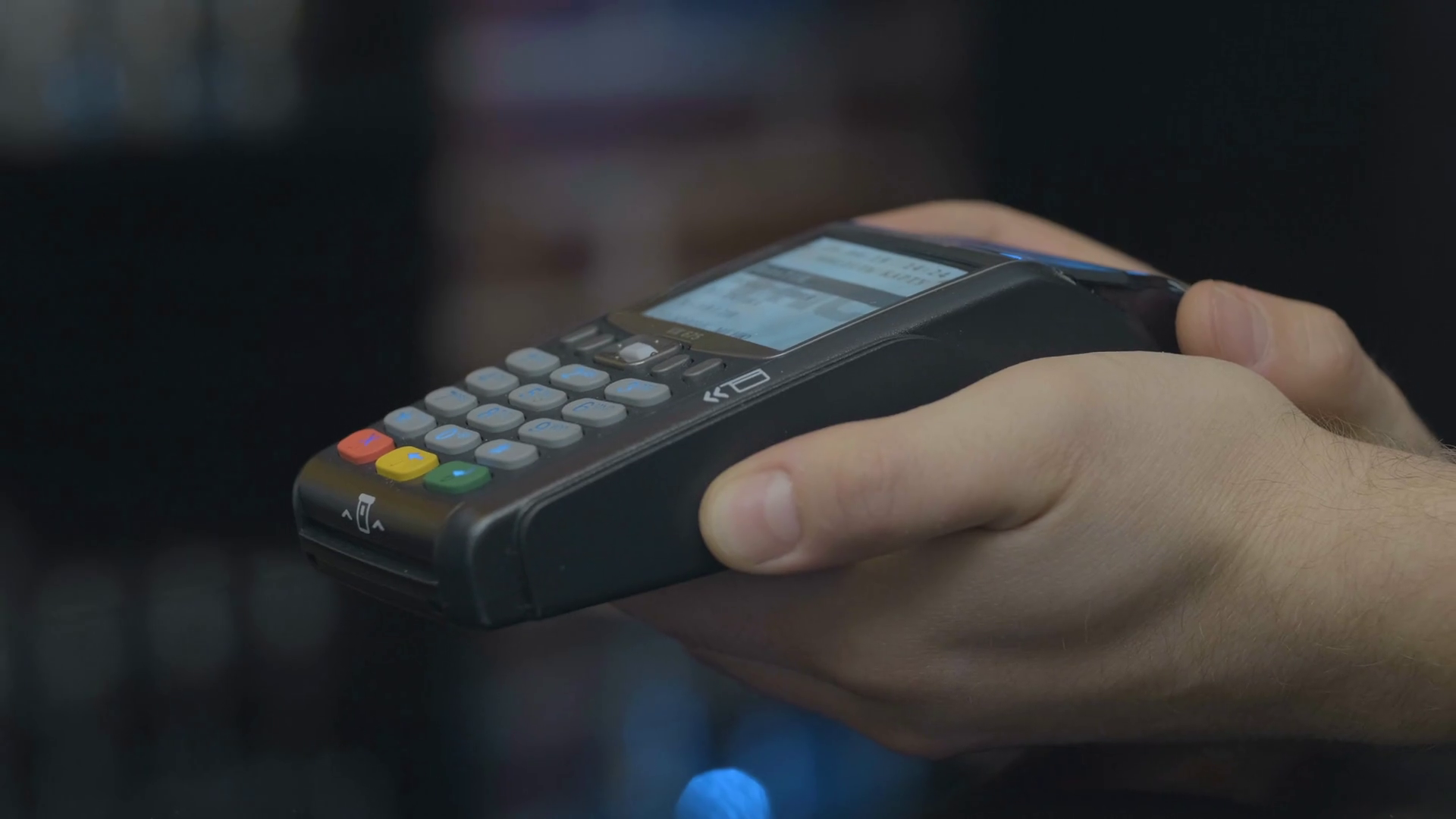 Credit card machine for money transaction. Man hand with credit card