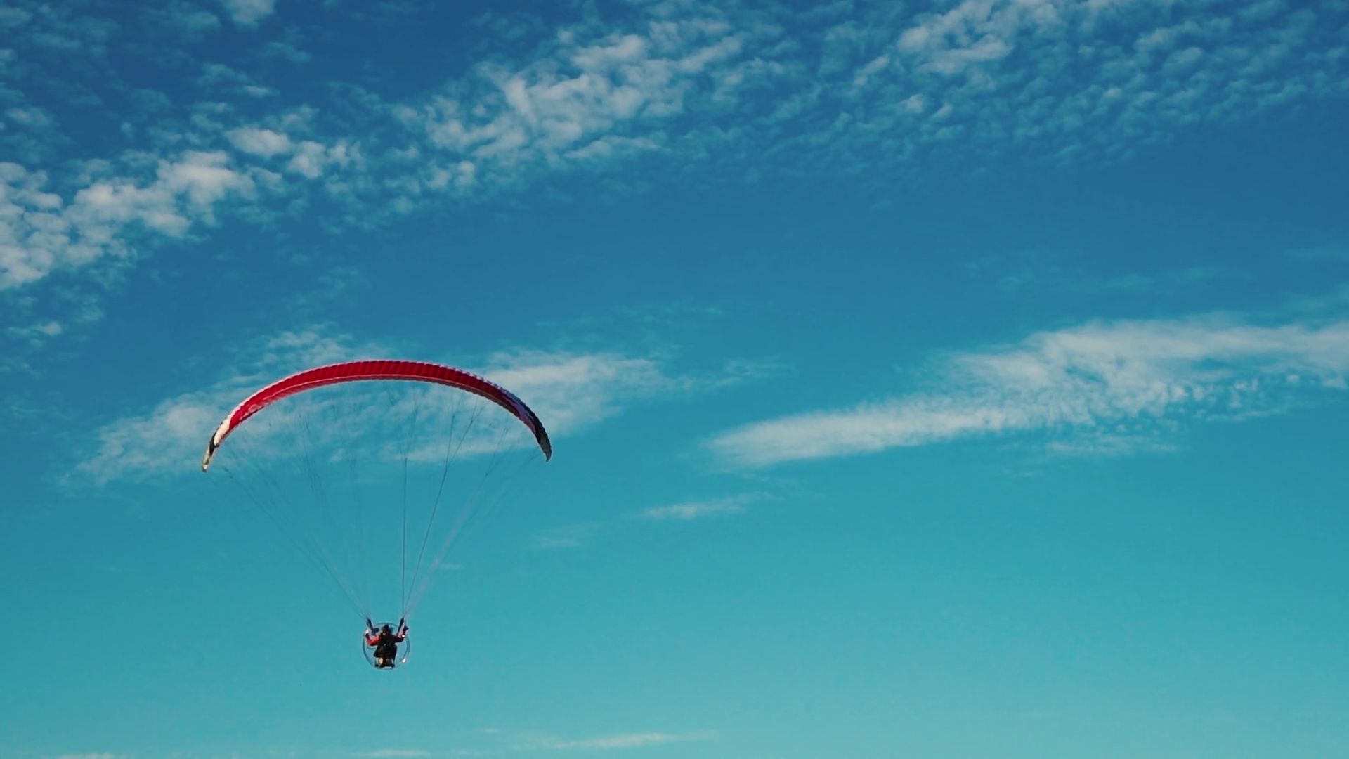 hang glider flying over a field Stock Video Footage 0034 SBV307951152