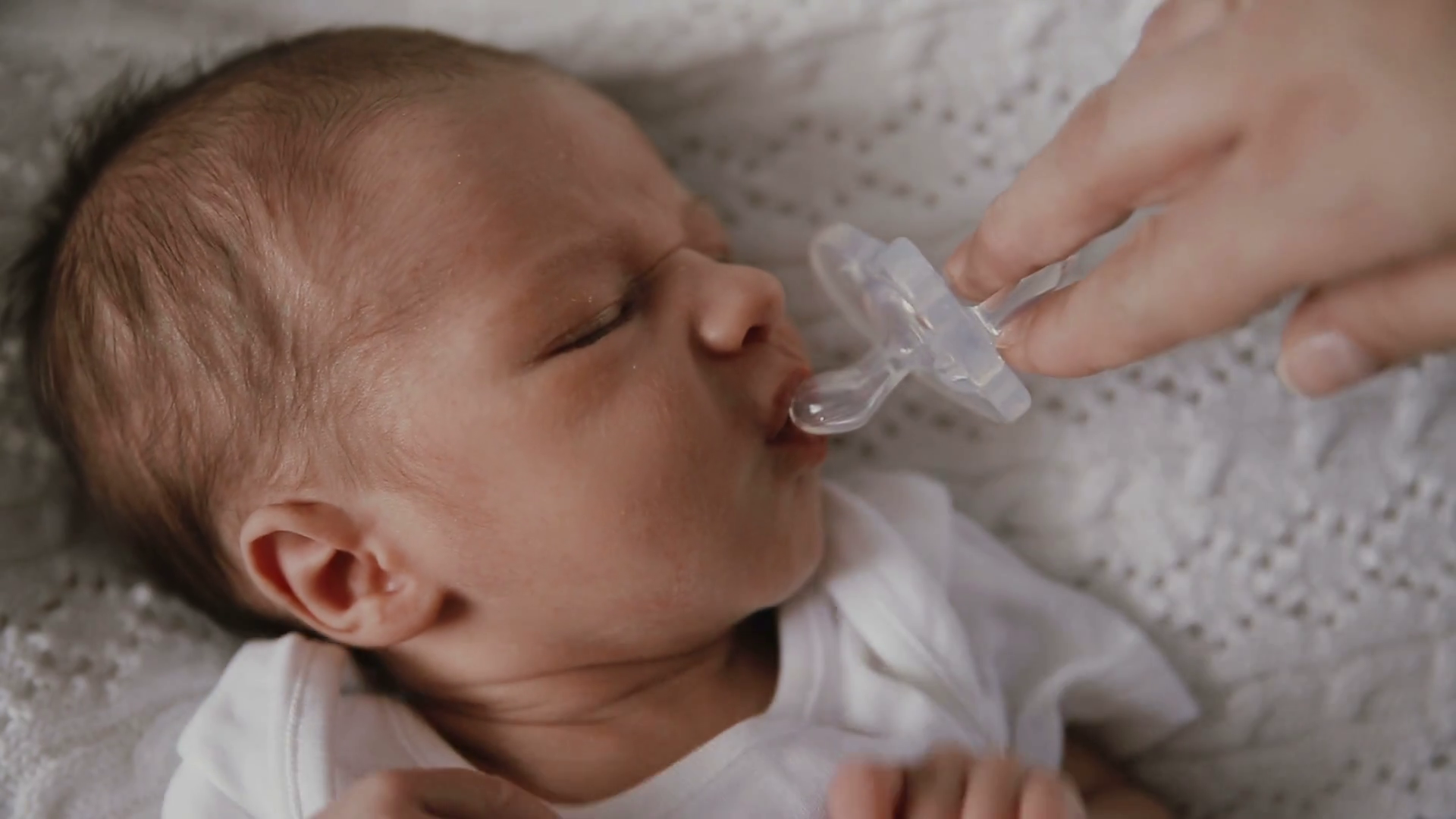 Mom Gives Baby Baby's Dummy Stock Footage SBV306124877 Storyblocks