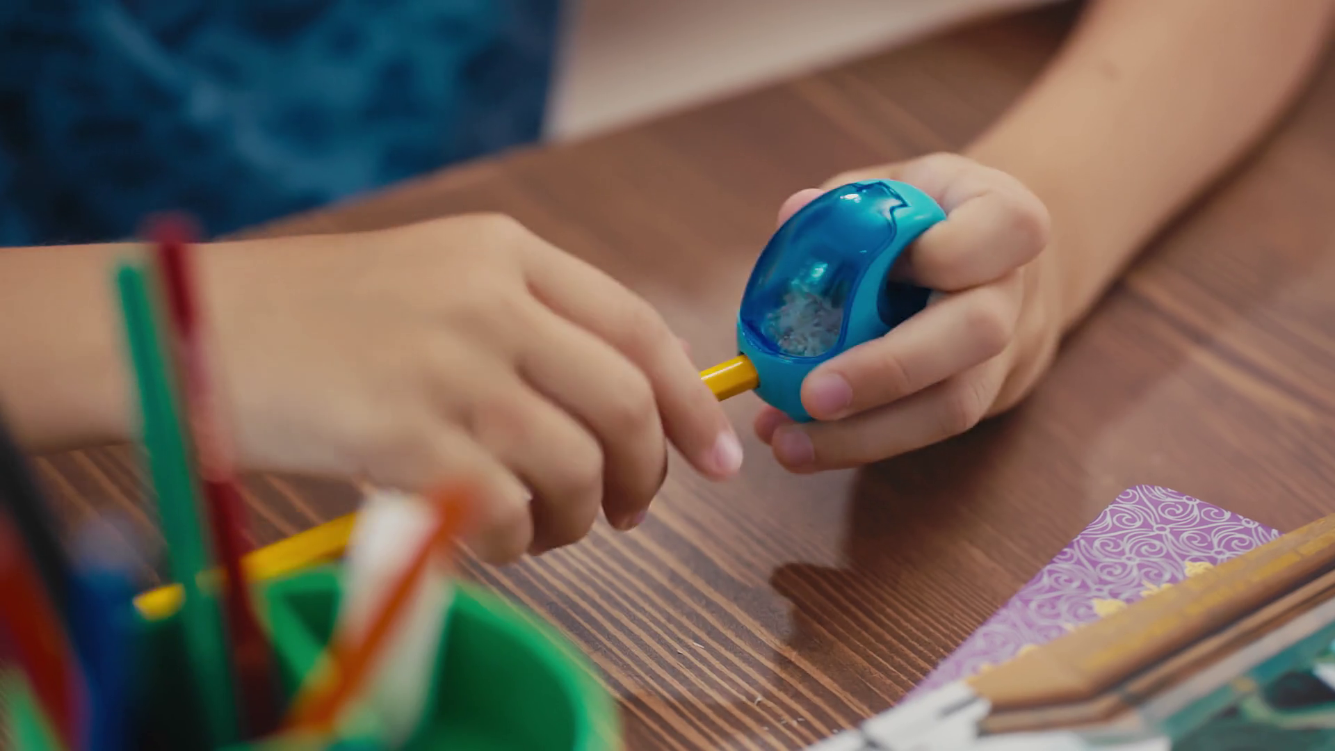 Back to school. Student sharpening a pencil. Stock Video Footage 0012