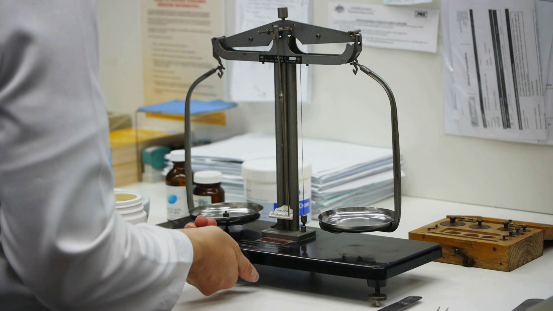 A Pharmacist Weighs Powder On Scales To Stock Footage SBV-353064951 ...