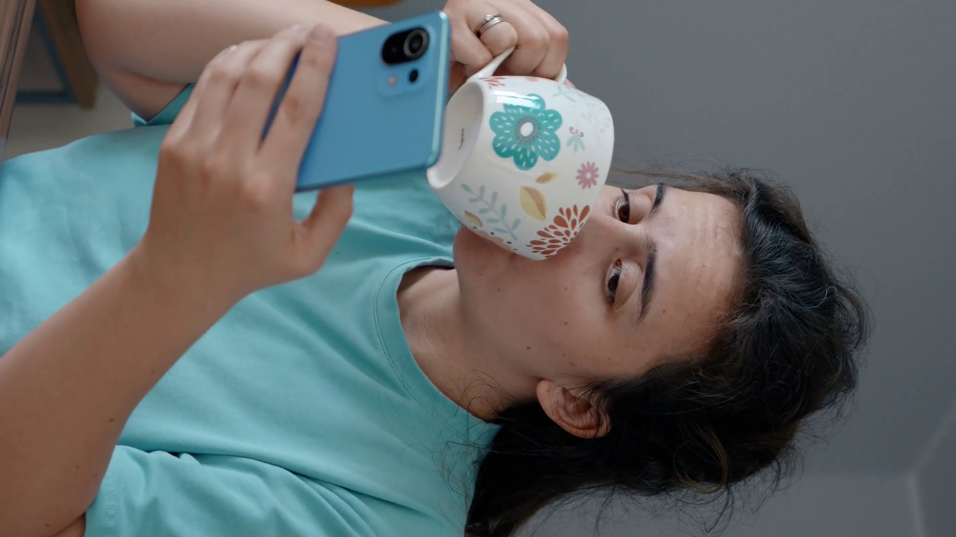 Vertical Of Woman Enjoys Hot Tea Watching Stock Footage SBV-351931811 ...
