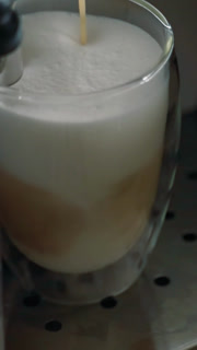 Vertical Of Modern Coffee Machine Makes Delicious Cappuccino At Home