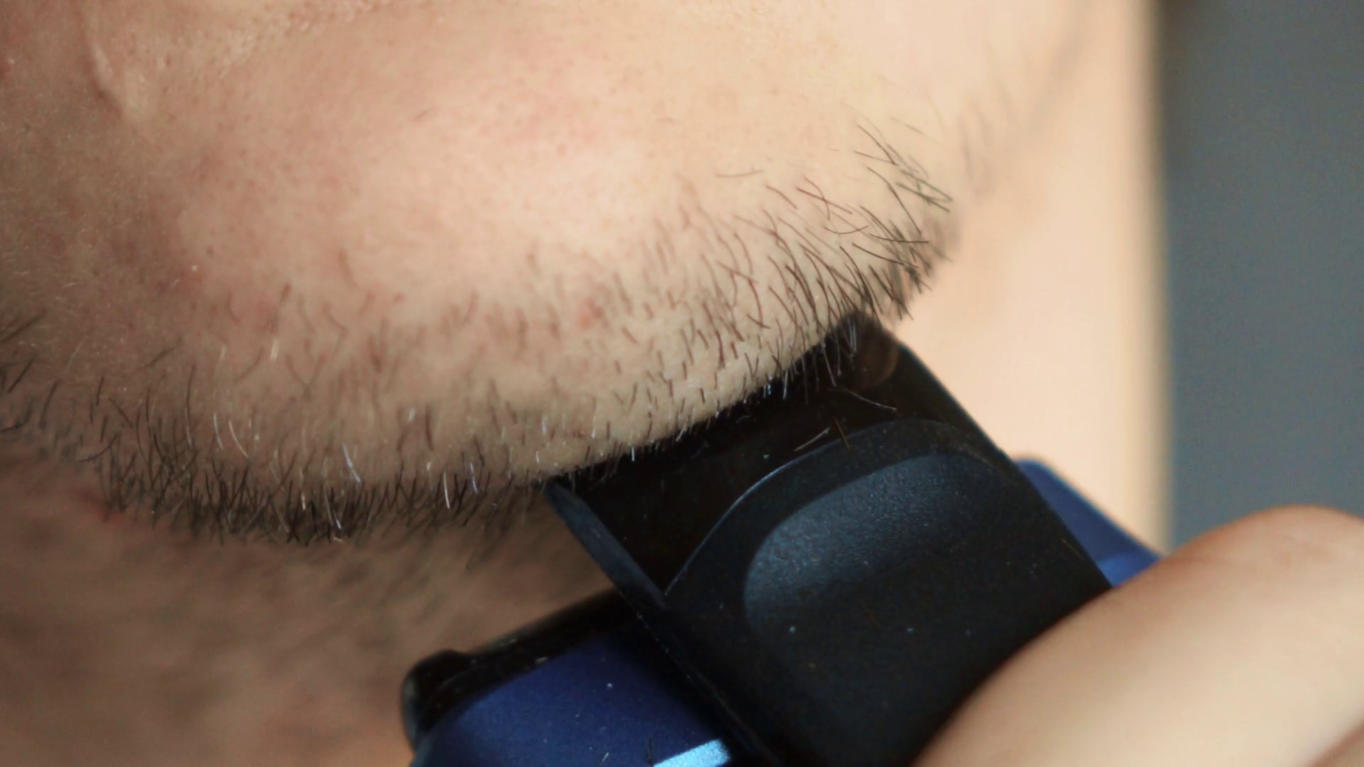 Man Shave Chin With Electric Shaver Stock Footage SBV306450717