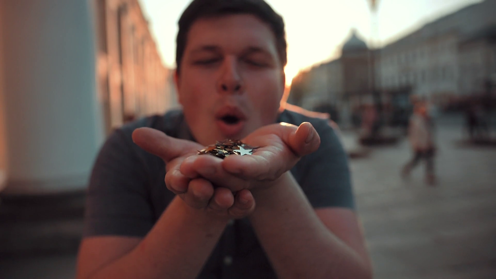 Young Man Blows Off Hands With Beautiful Stock Footage SBV338116809