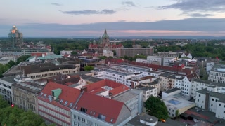 Aerial Hyperlapse around Hannover New Town Hall. Old Town At Sunset, copper domed Neues Rathaus in Lower Saxony, Germany