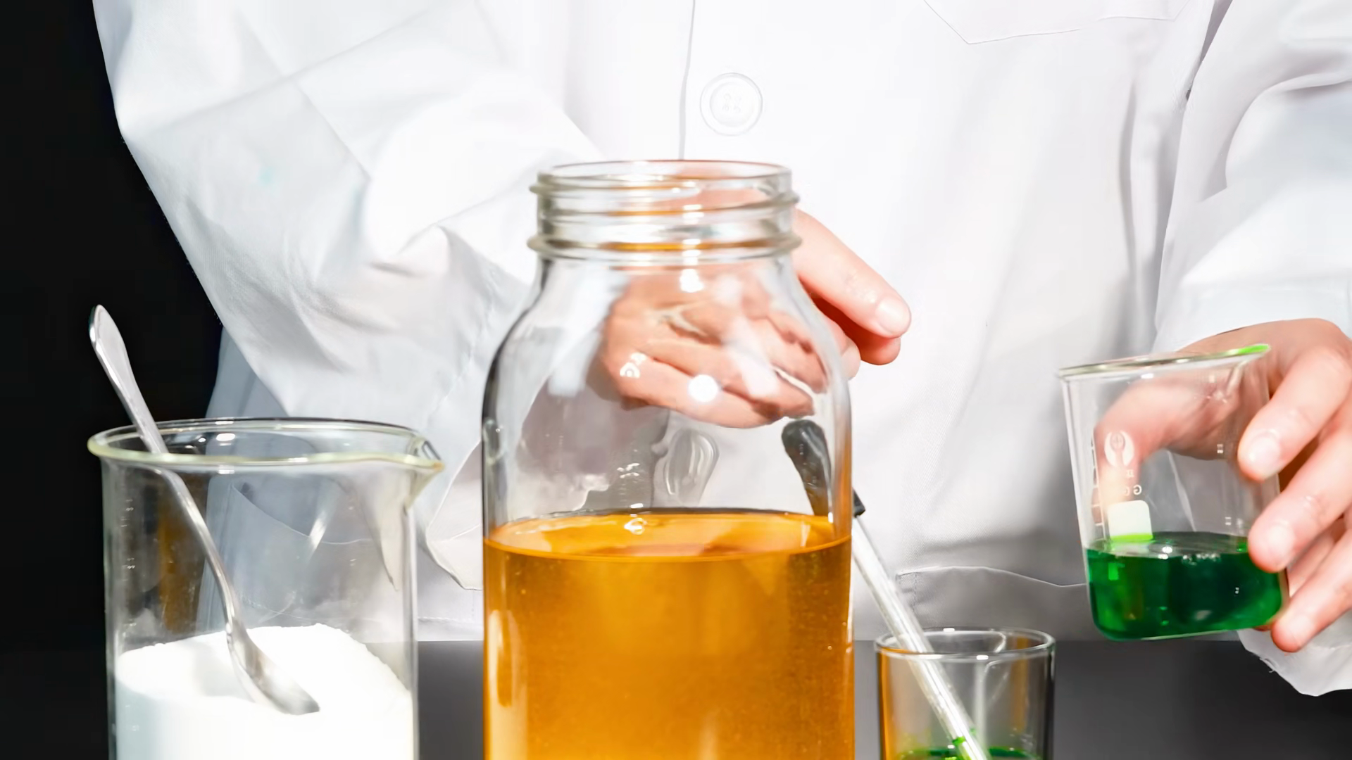 Mixing Green Liquid Into Yellow Solution Stock Footage SBV-353670856 ...