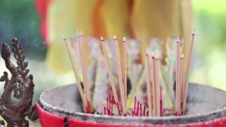 Incense Sticks Burning in Sequence