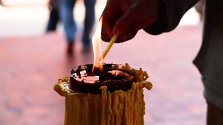 Lighting Candle in Ayutthaya