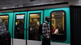 Commuter's Journey Through a Busy Metro Station