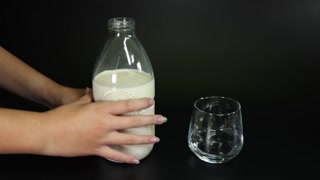 Pouring Milk into a Glass