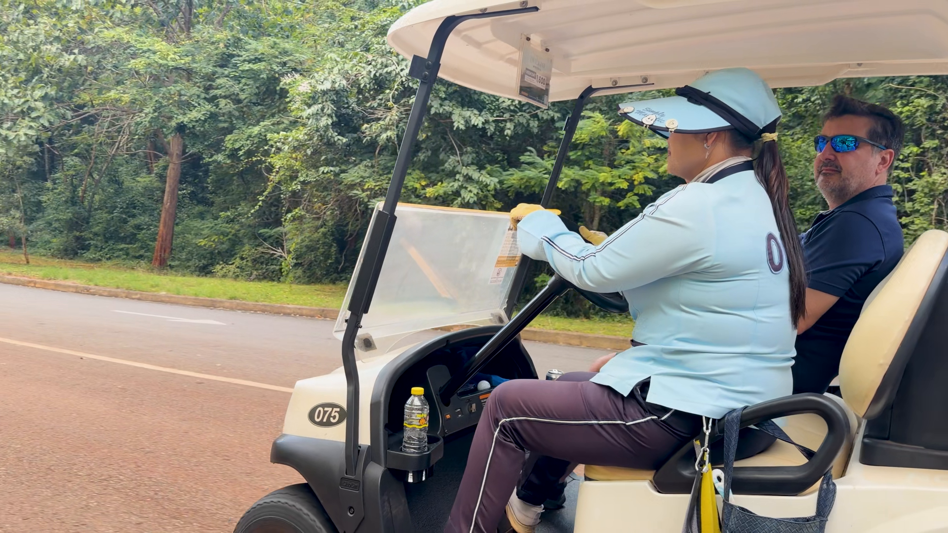 Golf Caddy Driving Cart With Golfer Through Stock Footage SBV-353630187 ...