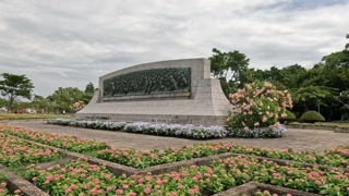Monument Surrounded by Blooming Flowers