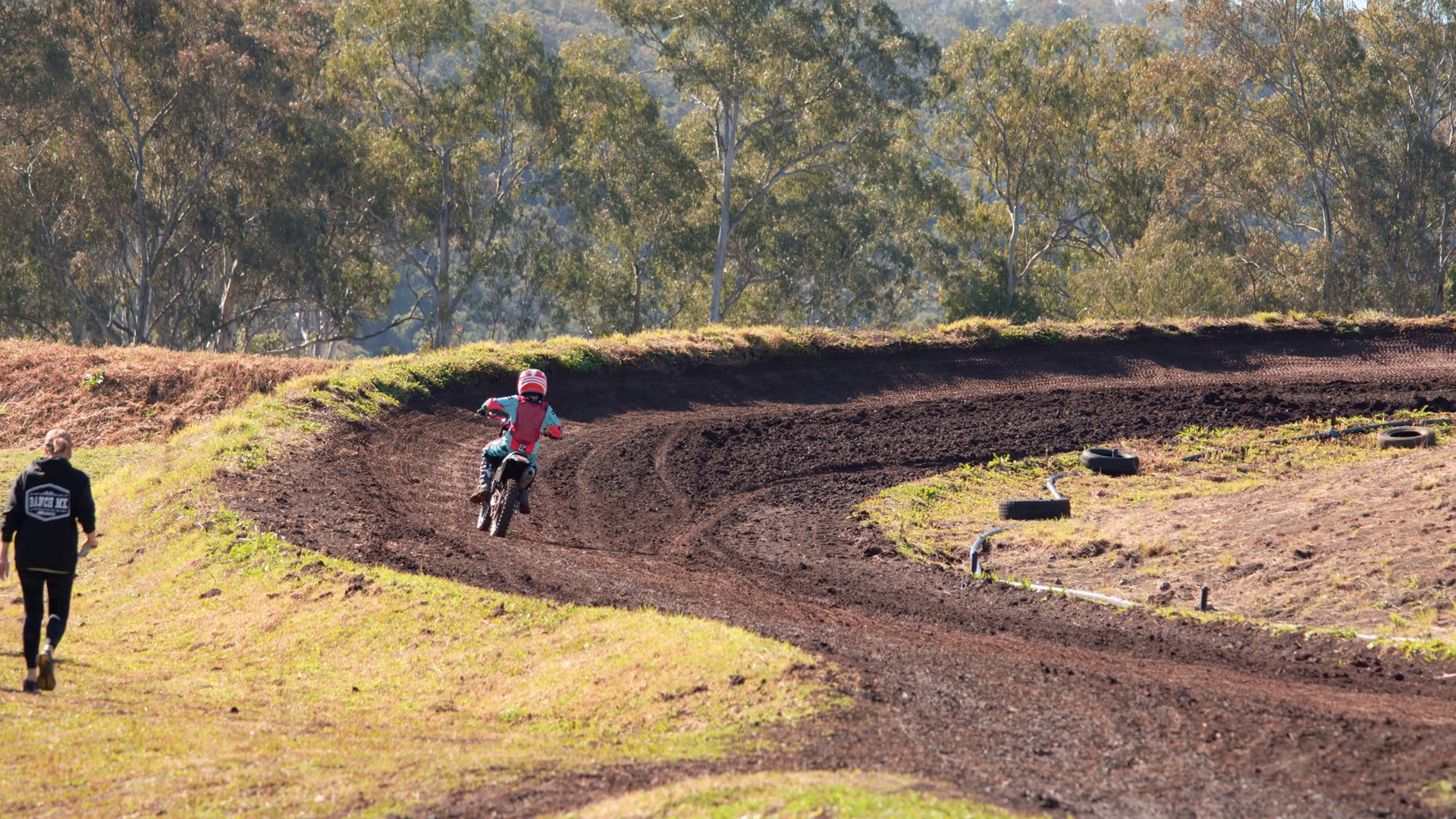 Young Female Rider Navigates Dirt Track Stock Footage SBV-352558903 ...