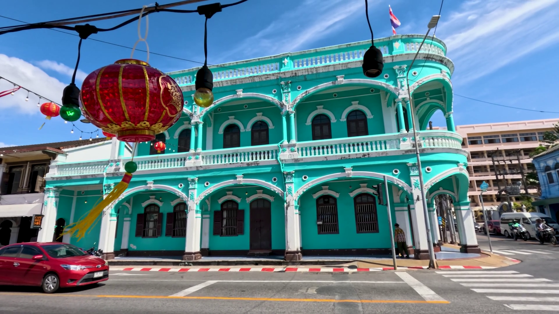 Van Passing Historic Turquoise Building In Stock Footage SBV-352994078 ...