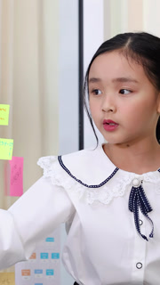 Asian Schoolgirls Collaborating on Science Project with Glass Board and Markers