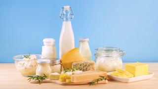Dairy Products Display on Blue Background