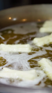 Chef Deep Frying Chinese Doughnuts Youtiao in Hot Oil Wok