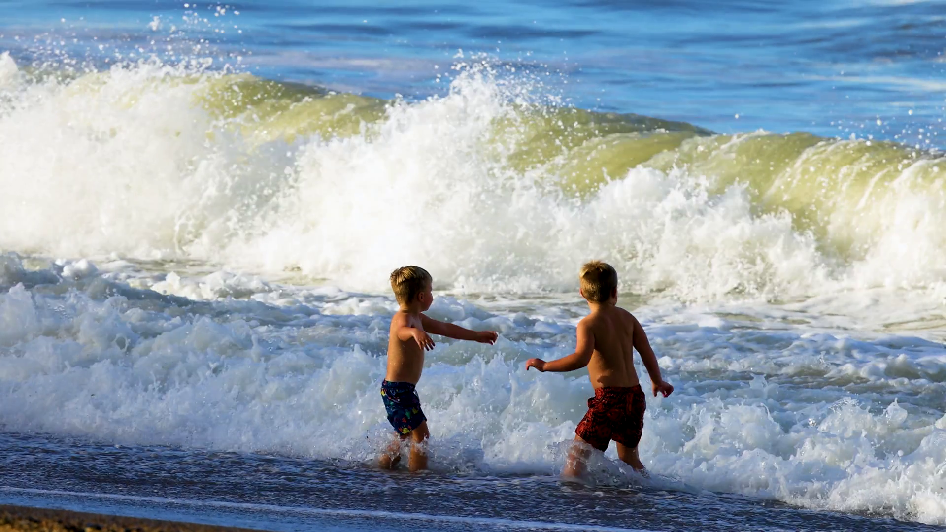 Children Playing In Waves At Charlesworth Stock Footage SBV-352448102 ...