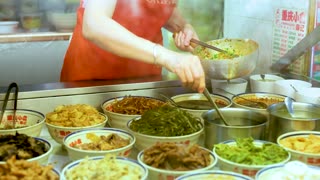 Street Vendor Preparing Chinese Dishes