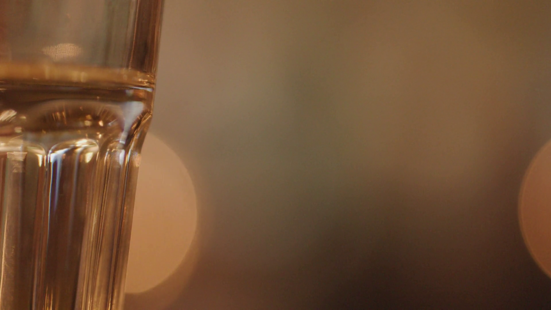 close-up-of-water-glass-at-night-in-stock-footage-sbv-352660470