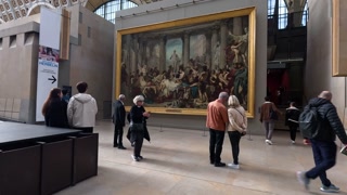Visitors Admiring Art at Orsay Museum