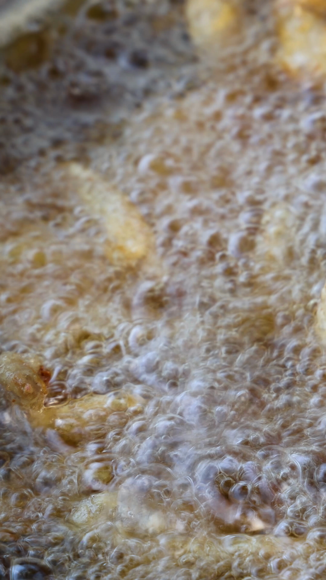 French Fries Deep Frying In Bubbling Hot Oil Stock Footage SBV ...