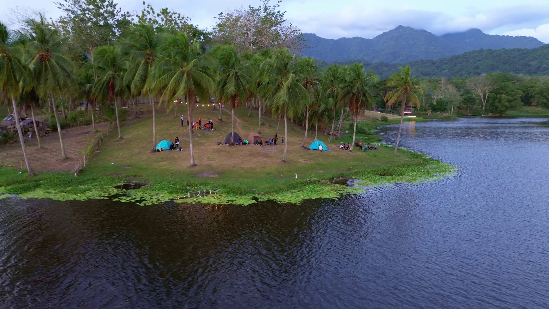 Aerial View Of Campsite Lake At Twilight Stock Footage SBV-352341534 ...