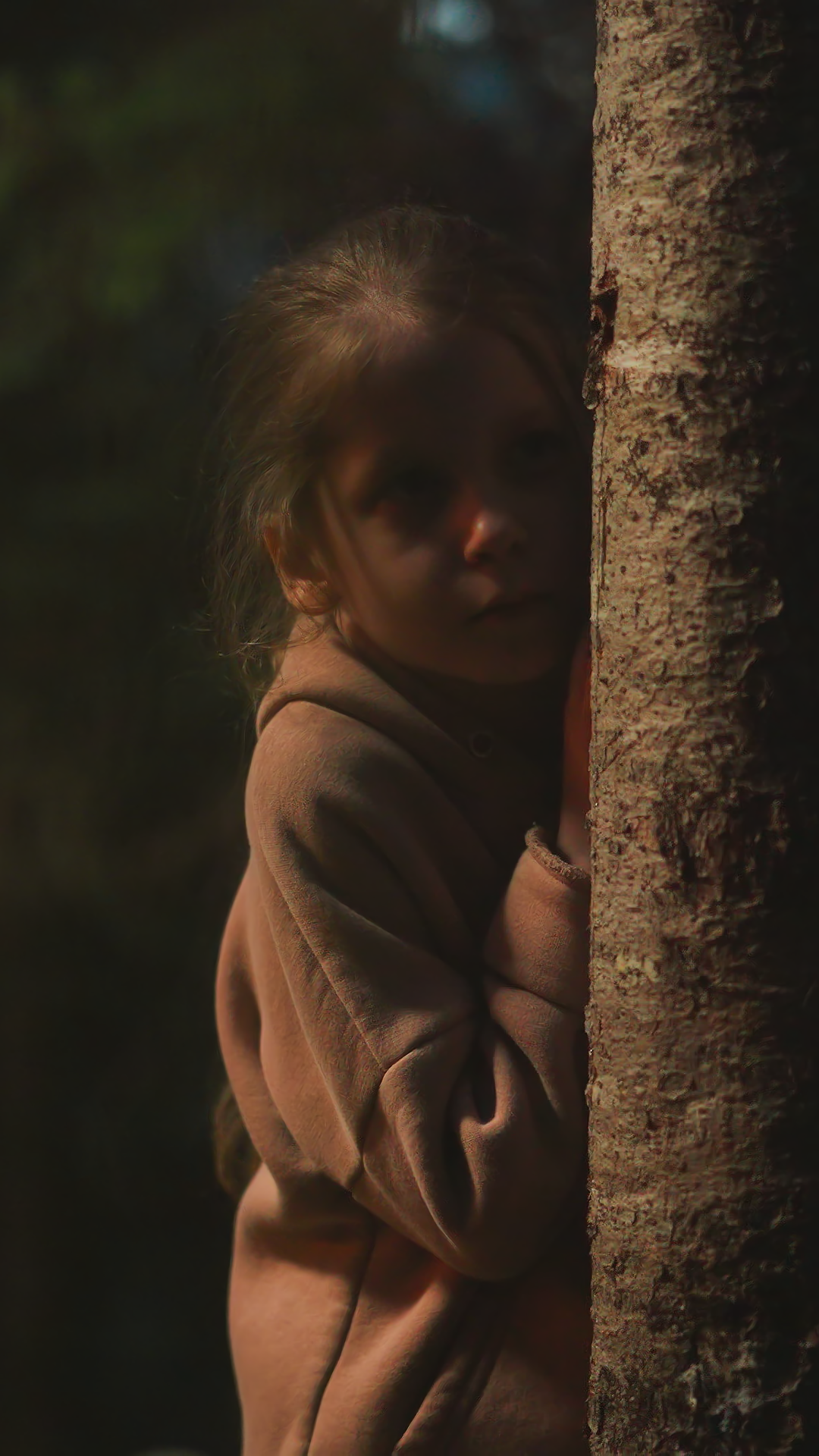 Scared Child Hides Behind Tree Trunk In Stock Footage SBV-353176622 ...
