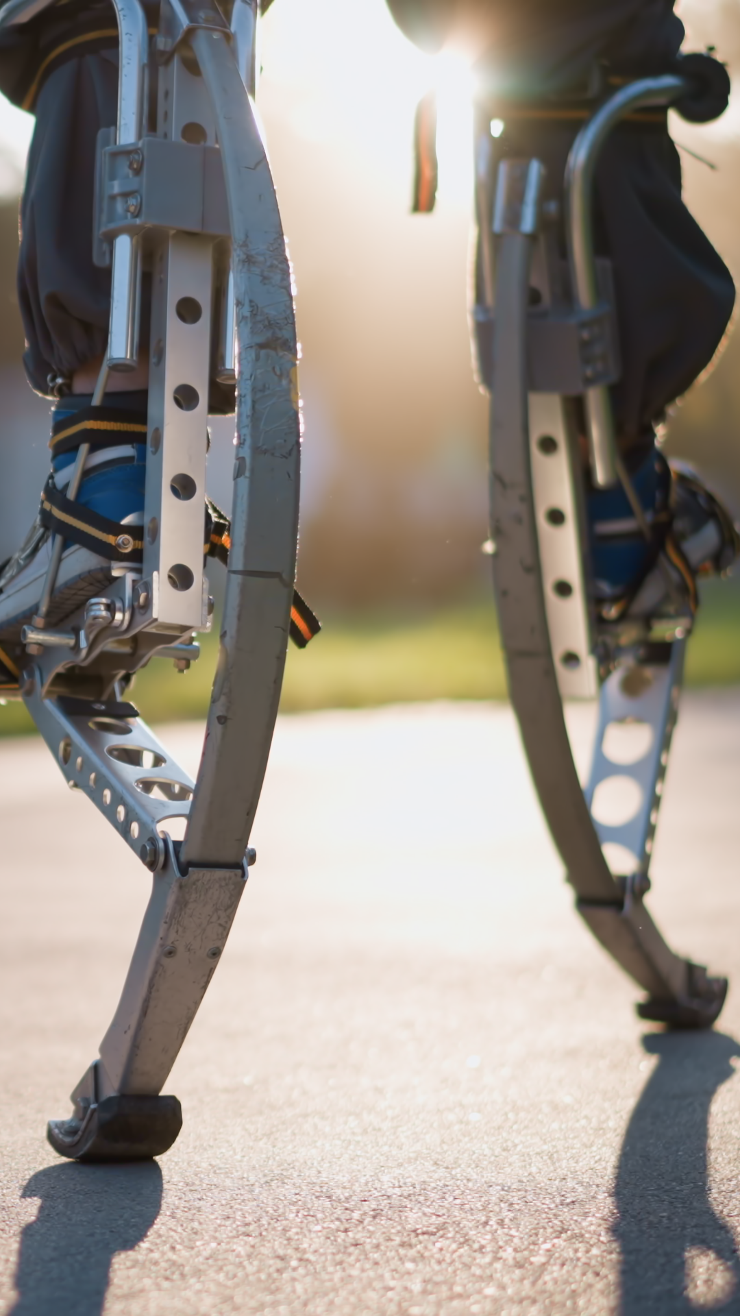 Chap's Legs Walking On Spring Stilts Along Stock Footage SBV-353254708 ...