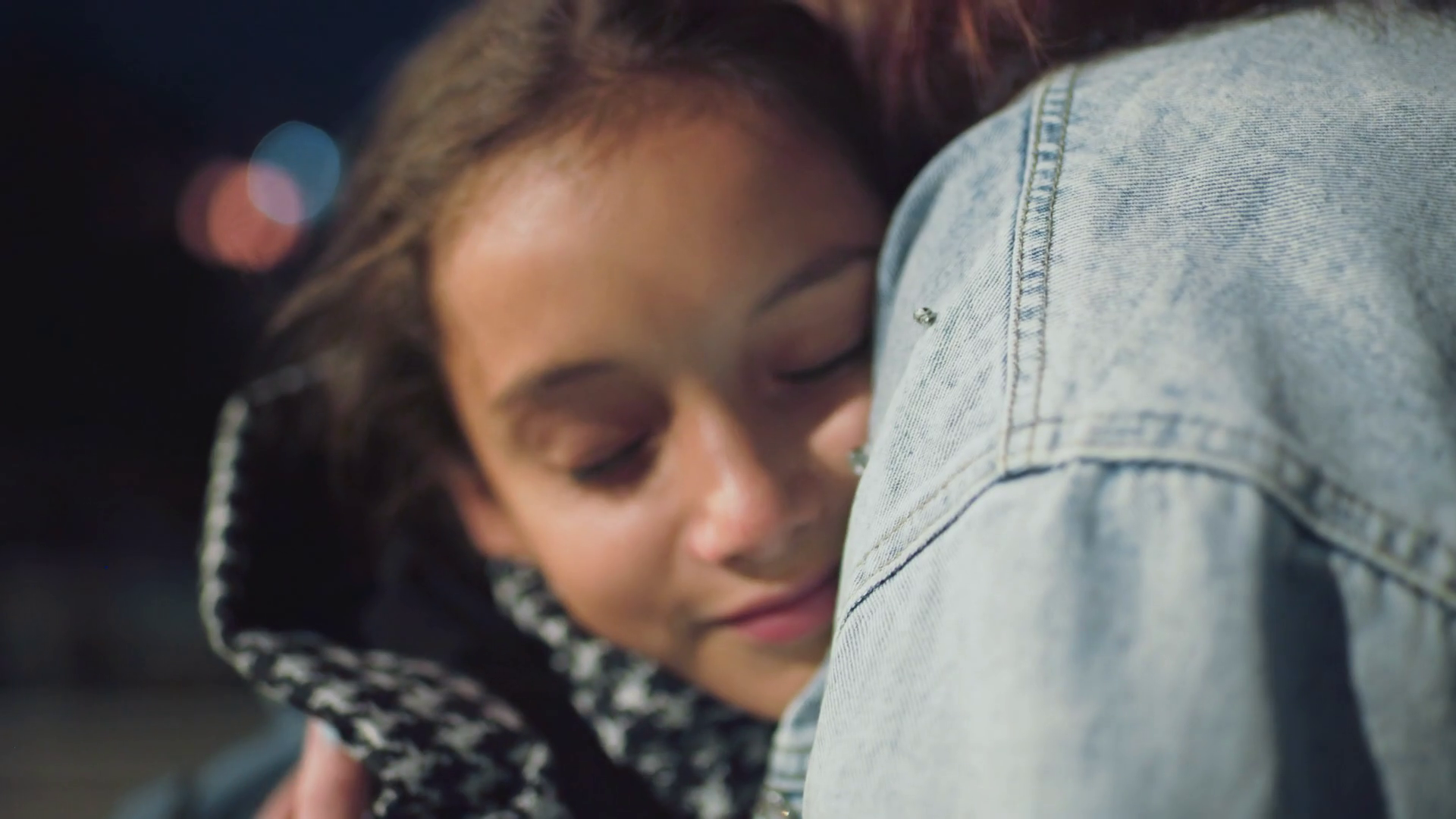 Young Girl With Soft Smile Rests In Warm Hug Stock Footage SBV ...