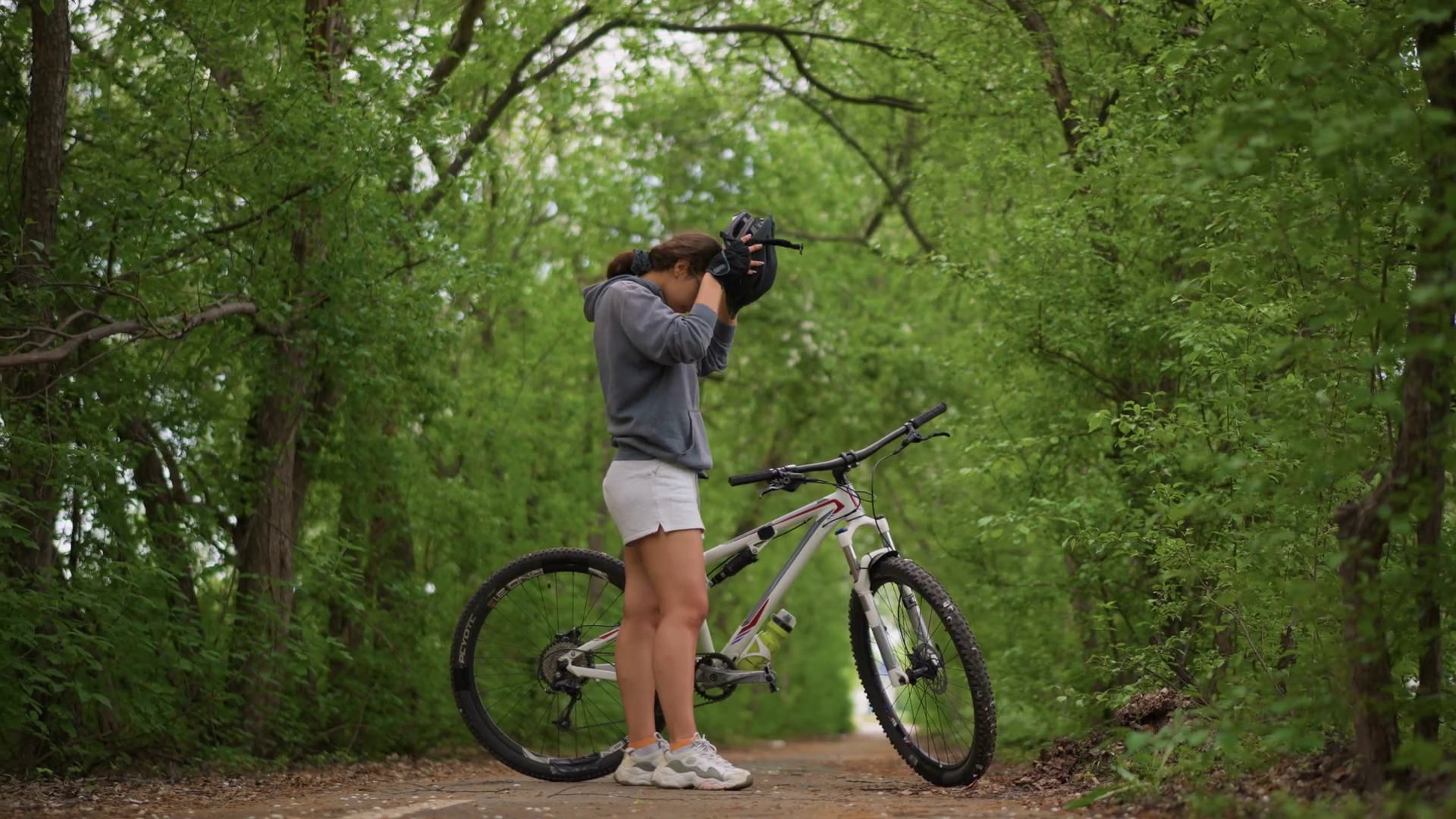 Asian Fitness Rider Making Final Adjustment Stock Footage SBV-353470010 ...