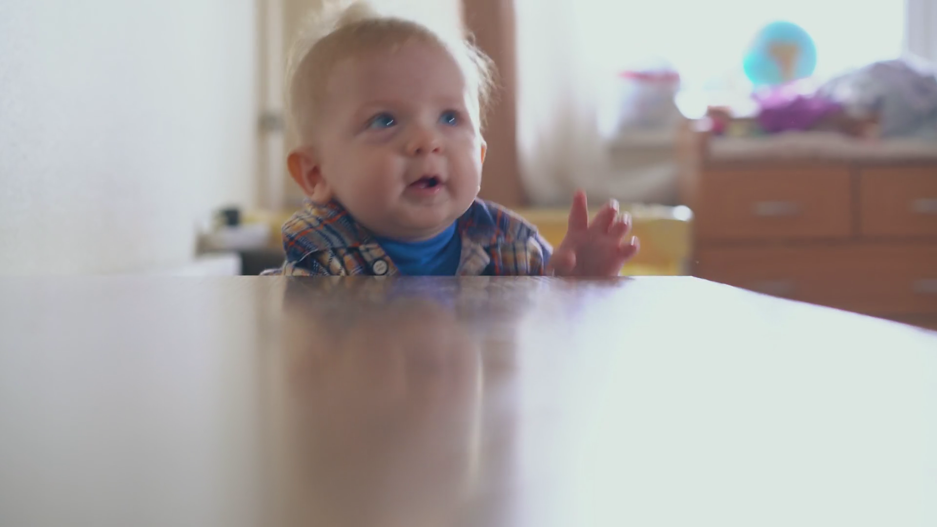 Playful Little Baby Boy Stands At Low Wooden Stock Footage SBV