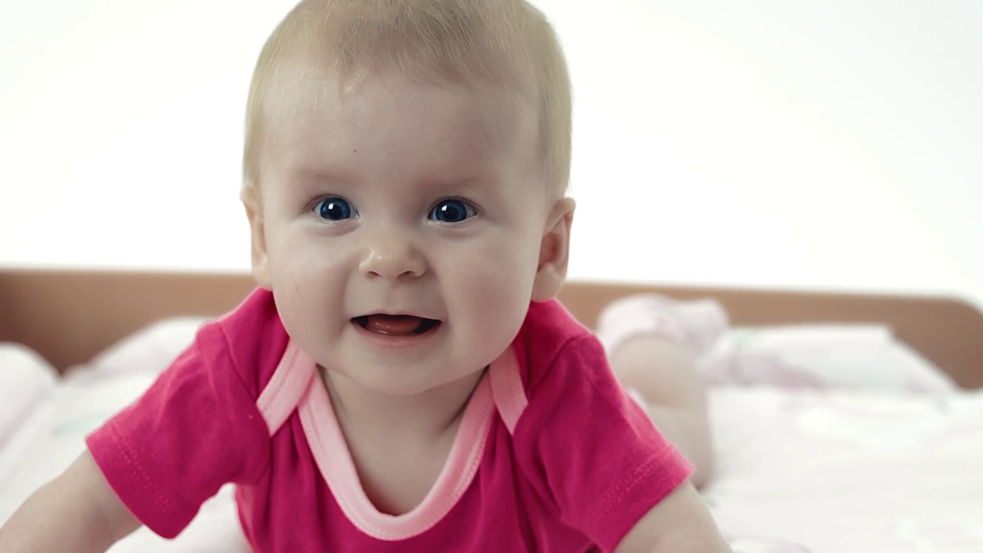 Little Pretty Baby Playing On Changing Table Stock Footage SBV