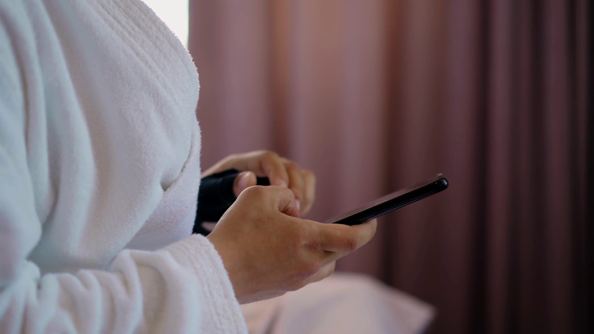 Young Man Guest In White Soft Bathrobe Uses Stock Footage SBV347315155