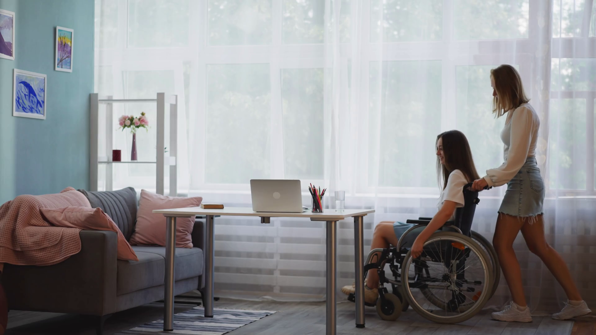 Young Woman Helps Disabled Sister In Stock Footage SBV347465740