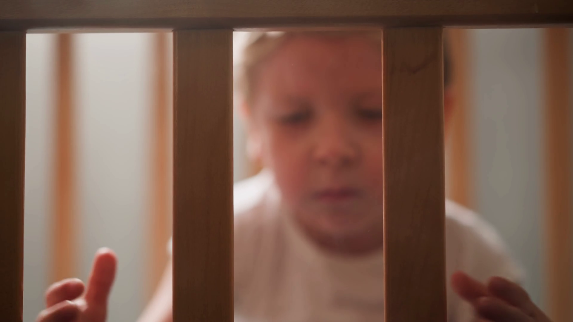 Upset Blond Toddler Looks Out Of Cot Stock Footage SBV347710778 Storyblocks