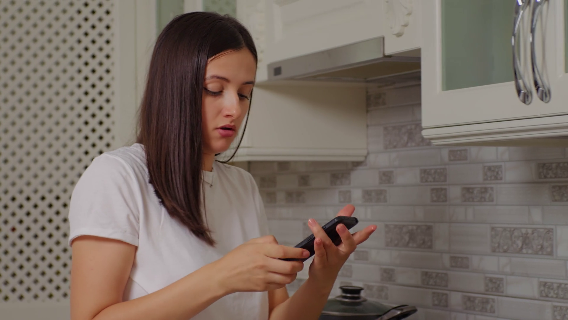 Woman Receiving Phone Call Cooking At Kitchen Stock Footage SBV ...