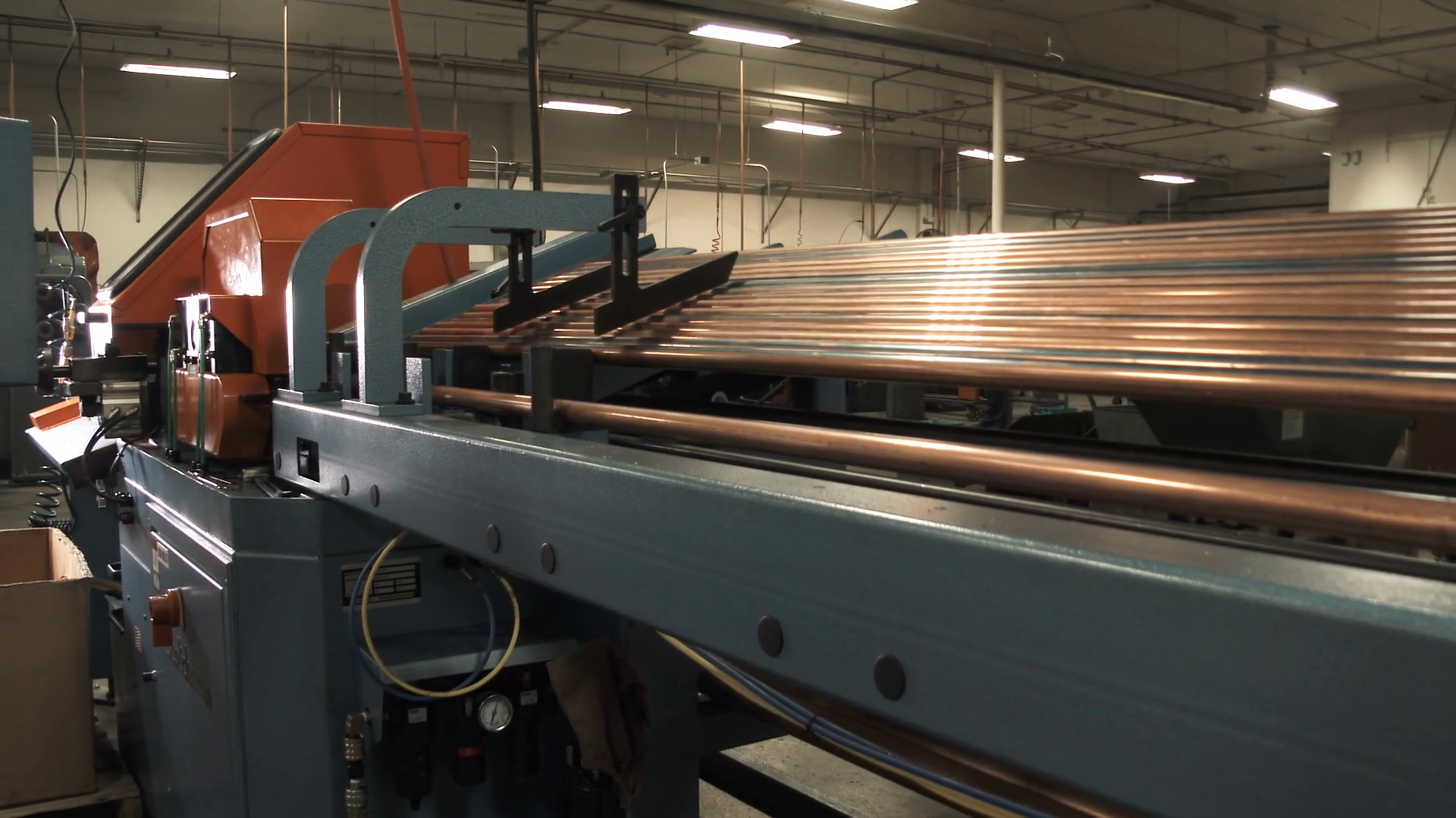 Large Industrial Machine Cutting Copper Tubing Stock Video Footage